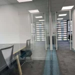 Office-space-design-with-framed-glass-door-glass-partitions-screen-11