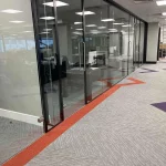 Office-space-design-with-framed-glass-door-glass-partitions-screen-13