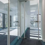 Office-space-design-with-framed-glass-door-glass-partitions-screen-14