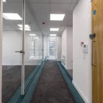 Office-space-design-with-framed-glass-door-glass-partitions-screen-7