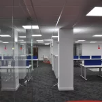 Office-space-design-with-frameless-glass-partitions-screen-1