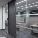 Office-space-design-with-solid-doors-glass-partitions