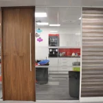 Office-space-design-with-solid-doors-glass-partitions-3