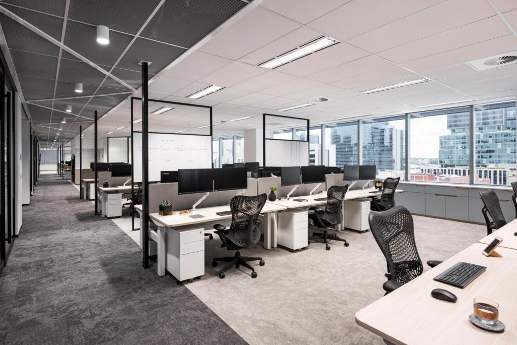 Modern office space planning and design with open workspace and collaboration areas
