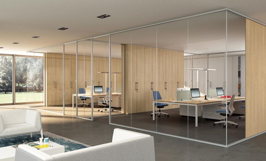Modern office with solid partitions improving privacy and workspace layout